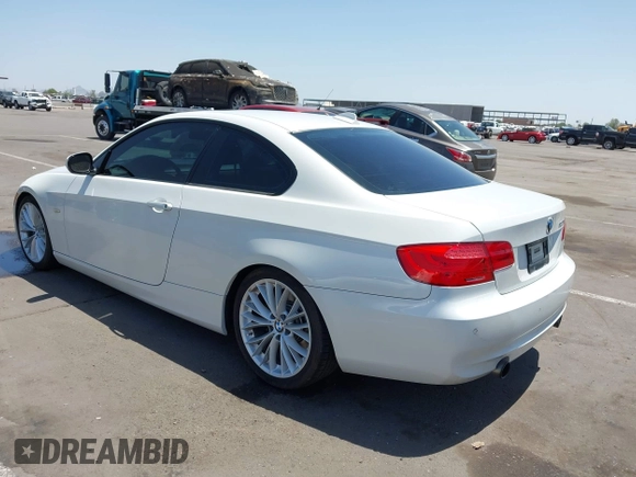 2011 BMW 3 Series 335i with VIN WBAKG7C53BE598107, listed as a IAAI auction lot 42498533 with 129,784 mi miles and . Bid and sale history available at DreamBid. Image 3.
