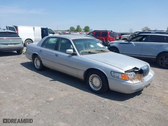 2002 Mercury Grand Marquis LS Premium with VIN 2MEFM75W02X660966, listed as a IAAI auction lot 41869806 with 133,758 mi miles. Bid and sale history available at carsss.com. Image 1.