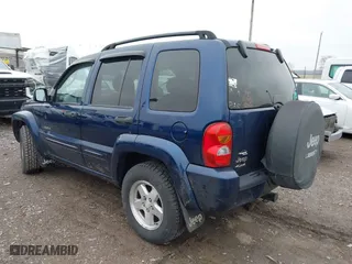 2004 Jeep Liberty Limited with VIN 1J4GL58K34W112569, listed as a IAAI auction lot 42021937 with 181,814 mi miles. Bid and sale history available at carsss.com. Image 3.