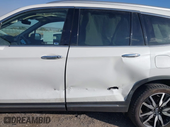 2022 Honda Pilot Touring 7-Passenger with VIN 5FNYF6H67NB017660, listed as a IAAI auction lot 41194603 with 87,301 mi miles. Bid and sale history available at carsss.com. Image 6.