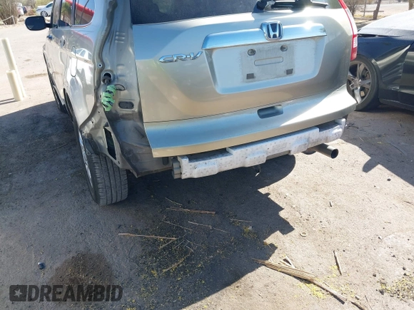 2009 Honda CR-V EX with VIN JHLRE38599C007909, listed as a IAAI auction lot 42077656 with 223,597 mi miles and . Bid and sale history available at carsss.com. Image 6.