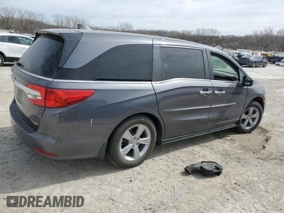 2019 Honda Odyssey EX-L with VIN 5FNRL6H77KB045363, listed as a Copart auction lot 49077865 with 66,701 mi miles and Salvage Title. Bid and sale history available at DreamBid. Image 3.