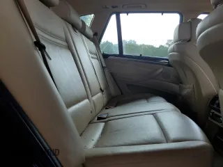 2012 BMW X5 35i with VIN 5UXZV4C54CL990112, listed as a Copart auction lot 59125245 with 142,742 mi miles and Clean title. Bid and sale history available at DreamBid. Image 11.