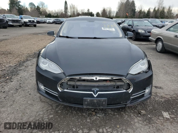 2014 Tesla Model S 60 with VIN 5YJSA1H18EFP45810, listed as a Copart auction lot 86313244 with Not Provided miles and Salvage Title. Bid and sale history available at DreamBid. Image 5.