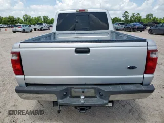 2001 Ford Ranger XL with VIN 1FTYR14V01PB46542, listed as a Copart auction lot 60977205 with 230,933 mi miles and Salvage title. Bid and sale history available at DreamBid. Image 6.