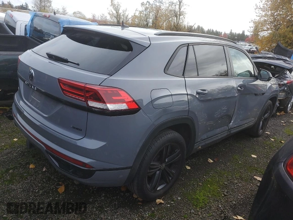 2023 Volkswagen Atlas SEL z VIN 1V2SE2CA8PC210959, wystawiony jako Copart lot #73726564 z przebiegiem 27 799 mil mil oraz Szkoda całkowita • Salvage title. Historia ofert i sprzedaży dostępna na DreamBid. Obrazek 3.