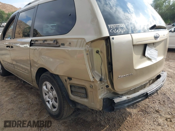 2009 Kia Sedona LX with VIN KNDMB233996303544, listed as a IAAI auction lot 41352987 with 230,510 mi miles. Bid and sale history available at carsss.com. Image 12.