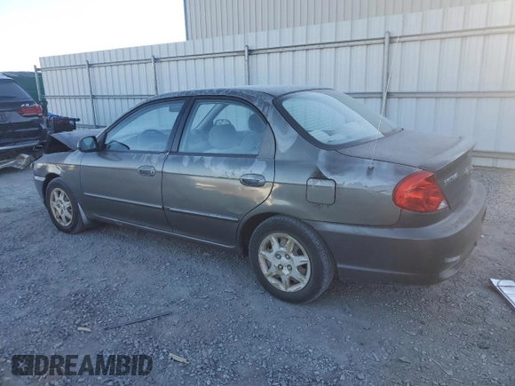 2003 Kia Spectra with VIN KNAFB121235248271, listed as a Copart auction lot 82426614 with 151,347 mi miles and Salvage Title. Bid and sale history available at DreamBid. Image 2.