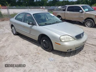 2005 Mercury Sable GS z VIN 1MEFM50U65A614386, wystawiony jako IAAI lot #42491470 z przebiegiem 159 590 mil mil oraz . Historia ofert i sprzedaży dostępna na DreamBid. Obrazek 1.
