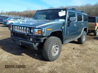 2005 Hummer H2 SUV with VIN 5GRGN23U15H117796, listed as a IAAI auction lot 41543913 with 195,560 mi miles. Bid and sale history available at carsss.com. Image 17.