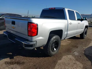 2018 Chevrolet Silverado 1500 LT with VIN 3GCPCREC9JG574686, listed as a IAAI auction lot 41676124 with 74,239 mi miles and . Bid and sale history available at DreamBid. Image 4.