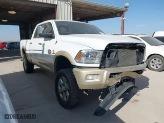 2014 Ram 2500 Longhorn with VIN 3C6UR5GLXEG244401, listed as a IAAI auction lot 41779709 with 180,760 mi miles. Bid and sale history available at carsss.com. Image 1.