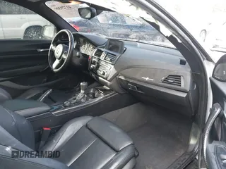 2015 BMW 2 Series 228i with VIN WBA1F5C55FV343662, listed as a IAAI auction lot 41729309 with 90,770 mi miles. Bid and sale history available at carsss.com. Image 5.