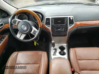 2011 Jeep Grand Cherokee Overland with VIN 1J4RR6GT9BC660730, listed as a Copart auction lot 53770745 with 106,351 mi miles and Salvage title. Bid and sale history available at DreamBid. Image 8.