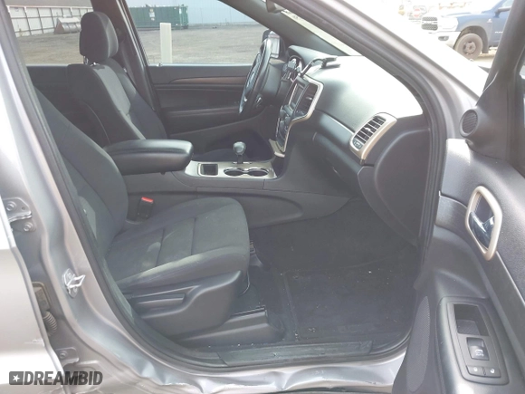 2015 Jeep Grand Cherokee Altitude with VIN 1C4RJFAG7FC905779, listed as a IAAI auction lot 42013150 with 95,018 mi miles. Bid and sale history available at carsss.com. Image 5.