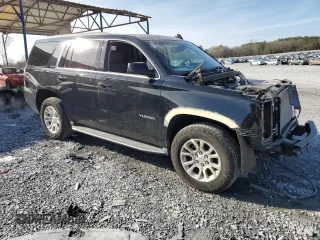 2016 GMC Yukon SLE with VIN 1GKS2AKC0GR250610, listed as a Copart auction lot 41695215 with 62,900 mi miles and Salvage Title. Bid and sale history available at carsss.com. Image 4.