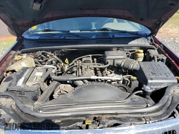 2000 Jeep Grand Cherokee Laredo z VIN 1J4GW48S8YC289367, wystawiony jako Copart lot #51378675 z przebiegiem 176 347 mil mil oraz Szkoda całkowita • Salvage title. Historia ofert i sprzedaży dostępna na DreamBid. Obrazek 12.
