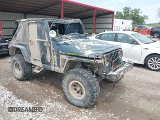 2006 Jeep Wrangler Sport z VIN 1J4FA49S96P722788, wystawiony jako IAAI lot #42400029 z przebiegiem 138 972 mil mil oraz . Historia ofert i sprzedaży dostępna na DreamBid. Obrazek 1.