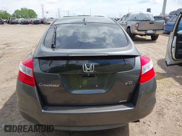 2012 Honda Crosstour EX-L z VIN 5J6TF2H53CL011899, wystawiony jako IAAI lot #42182571 z przebiegiem 154 801 mil mil oraz . Historia ofert i sprzedaży dostępna na DreamBid. Obrazek 16.