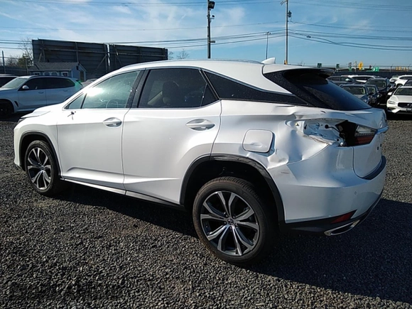 2022 Lexus RX with VIN 2T2HZMDA9NC349721, listed as a Copart auction lot 73320442 with 2,135 mi miles. Bid and sale history available at carsss.com. Image 4.