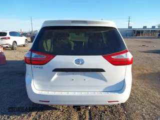 2017 Toyota Sienna L with VIN 5TDZZ3DC3HS828040, listed as a IAAI auction lot 41824384 with 76,159 mi miles. Bid and sale history available at carsss.com. Image 17.