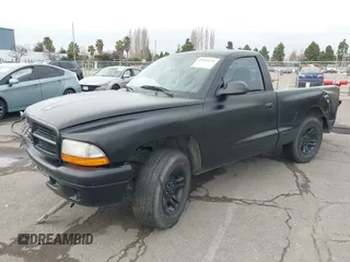 2004 Dodge Dakota with VIN 1D7FL16K64S578877, listed as a IAAI auction lot 41568126 with 93,657 mi miles. Bid and sale history available at carsss.com. Image 17.