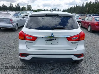 2018 Mitsubishi Outlander ES z VIN JA4AP3AU1JZ005296, wystawiony jako IAAI lot #42327265 z przebiegiem 91 300 mil mil oraz . Historia ofert i sprzedaży dostępna na DreamBid. Obrazek 16.