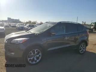2015 Ford Escape Titanium с VIN 1FMCU9J9XFUA25181, выставлен на аукционе Copart как лот 77689574 с пробегом 134 433 миль миль и Списание • Salvage title. История ставок и продаж доступна на DreamBid. Изображение 1.