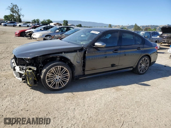 2019 BMW 5 Series M550i xDrive with VIN WBAJB9C50KB464503, listed as a Copart auction lot 56995825 with 67,324 mi miles and Salvage title. Bid and sale history available at DreamBid. Image 1.