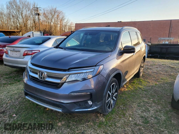 2020 Honda Pilot Touring 8-Passenger with VIN 5FNYF6H93LB022913, listed as a Copart auction lot 50825655 with 10,513 mi miles and Salvage Title. Bid and sale history available at DreamBid. Image 2.