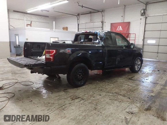 2018 Ford F-150 XL with VIN 1FTEX1EP1JKE74560, listed as a IAAI auction lot 41531539 with 54,558 mi miles and . Bid and sale history available at DreamBid. Image 4.