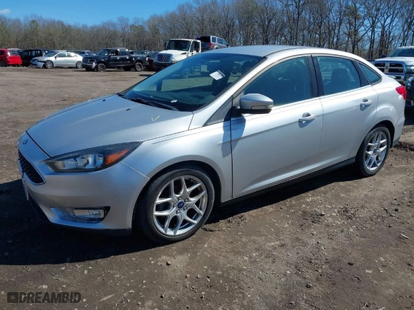 2015 Ford Focus SE with VIN 1FADP3F28FL292663, listed as a IAAI auction lot 41865686 with 999,999 mi miles. Bid and sale history available at carsss.com. Image 2.