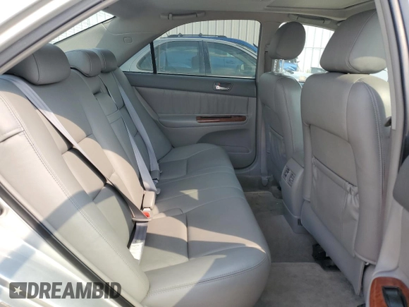 2006 Toyota Camry LE z VIN 4T1BF30K66U115872, wystawiony jako Copart lot #60526695 z przebiegiem 164 561 mil mil oraz Szkoda całkowita • Salvage title. Historia ofert i sprzedaży dostępna na DreamBid. Obrazek 10.