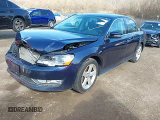 2015 Volkswagen Passat 1.8T Limited Edition with VIN 1VWAT7A33FC091945, listed as a IAAI auction lot 41930380 with 145,488 mi miles. Bid and sale history available at carsss.com. Image 2.