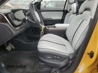 2022 Rivian R1T Launch Edition z VIN 7FCTGAAL2NN011755, wystawiony jako Copart lot #59934185 z przebiegiem 12 261 mil mil oraz Szkoda całkowita • Salvage title. Historia ofert i sprzedaży dostępna na DreamBid. Obrazek 7.