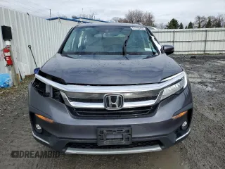 2020 Honda Pilot Touring 7-Passenger with VIN 5FNYF6H60LB039609, listed as a Copart auction lot 51753425 with 57,512 mi miles and Salvage title. Bid and sale history available at DreamBid. Image 5.