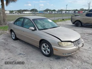 1998 Cadillac Catera z VIN W06VR52R3WR179841, wystawiony jako IAAI lot #41535621 z przebiegiem 103 204 mil mil oraz . Historia ofert i sprzedaży dostępna na DreamBid. Obrazek 1.