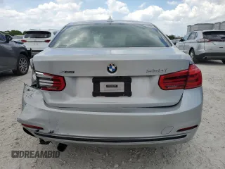 2018 BMW 3 Series 330i xDrive with VIN WBA8D9C50JEM33631, listed as a Copart auction lot 57595925 with 96,582 mi miles and Salvage title. Bid and sale history available at DreamBid. Image 6.
