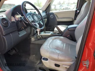 2002 Jeep Liberty Limited with VIN 1J8GL58K42W328443, listed as a Copart auction lot 52768345 with 218,459 mi miles and Salvage title. Bid and sale history available at DreamBid. Image 7.