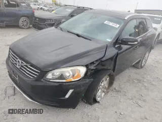 2015 Volvo XC60 T5 Drive-E Premier z VIN YV440MDK6F2659361, wystawiony jako Copart lot #53571815 z przebiegiem 142 819 mil mil oraz Szkoda całkowita • Salvage title. Historia ofert i sprzedaży dostępna na DreamBid. Obrazek 1.