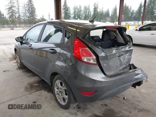 2016 Ford Fiesta SE with VIN 3FADP4EJ0GM150290, listed as a IAAI auction lot 41802899 with 126,778 mi miles. Bid and sale history available at carsss.com. Image 3.