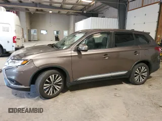 2019 Mitsubishi Outlander SE with VIN JA4AD3A39KZ010618, listed as a Copart auction lot 60504615 with 102,767 mi miles and Salvage title. Bid and sale history available at DreamBid. Image 1.