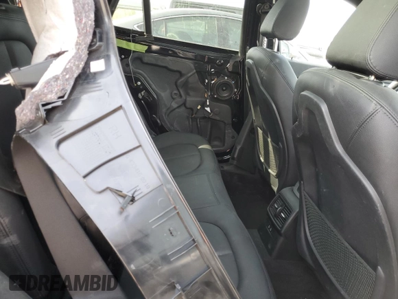2020 BMW X1 xDrive28i with VIN WBXJG9C06L5P89796, listed as a Copart auction lot 52817235 with 95,665 mi miles and Salvage title. Bid and sale history available at DreamBid. Image 11.