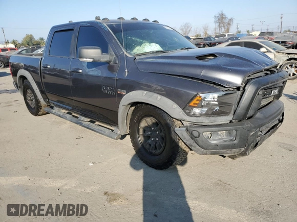 2018 Ram 1500 Rebel z VIN 1C6RR7YT1JS161619, wystawiony jako Copart lot #58272215 z przebiegiem 49 567 mil mil oraz Szkoda całkowita • Salvage title. Historia ofert i sprzedaży dostępna na DreamBid. Obrazek 4.
