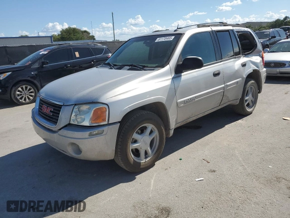 2004 GMC Envoy SLT с VIN 1GKDS13S542129977, выставлен на аукционе Copart как лот 61170465 с пробегом 129 897 миль миль и Списание • Salvage title. История ставок и продаж доступна на DreamBid. Изображение 1.