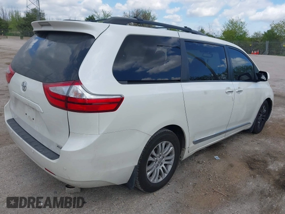 2016 Toyota Sienna XLE with VIN 5TDYK3DC4GS702638, listed as a IAAI auction lot 42255793 with 124,977 mi miles and . Bid and sale history available at DreamBid. Image 4.