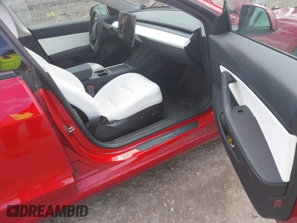 2021 Tesla Model 3 Long Range with VIN 5YJ3E1EB0MF902833, listed as a IAAI auction lot 41854474 with 41,982 mi miles and . Bid and sale history available at DreamBid. Image 5.