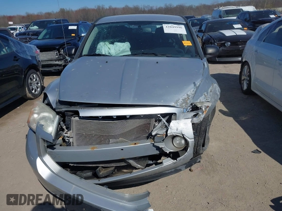2011 Dodge Caliber Mainstreet with VIN 1B3CB3HA9BD295750, listed as a IAAI auction lot 42049996 with Not Provided miles. Bid and sale history available at carsss.com. Image 12.