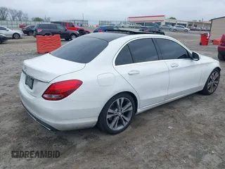 2015 Mercedes-Benz C 300 with VIN 55SWF4JB0FU085110, listed as a IAAI auction lot 41878764 with 115,326 mi miles and . Bid and sale history available at carsss.com. Image 4.