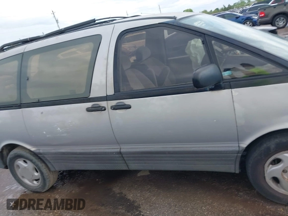 1997 Toyota Previa z VIN JT3GK12M0V1247510, wystawiony jako IAAI lot #41911370 z przebiegiem 218 832 mil mil oraz . Historia ofert i sprzedaży dostępna na DreamBid. Obrazek 13.